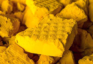 Chunk of uranium concentrate, otherwise known as yellowcake.
