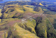 Looking down at a grid of trails established during drilling at Manh Choh.