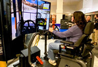 A Canadian First Nation girl drives a virtual mining truck.