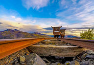 An old mine cart on a rail outside the historic Keno Hill mine.