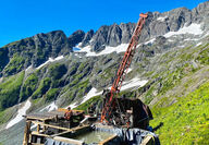 A drill tests for high-grade gold on a mountainside in Southeast Alaska.