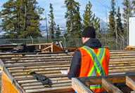 Geologist examining drill core from Whitehorse Copper project.