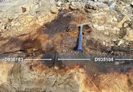 Limestone stained from massive sulfide silver-zinc-lead-copper mineralization.