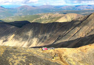 A drill test for gold from atop a mountain saddle in the Yukon.