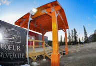 Coeur Silvertip sign in front of a building at the Silvertip Mine entrance.