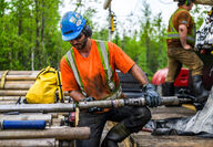 Technicians preparing drill at Li-FT’s Yellowknife Lithium project.