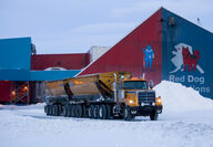 Truck with two trailers of zinc concentrates leaves Red Dog Mine in Alaska.