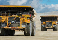 Large Cat haul trucks open pit gold mine Fairbanks Alaska