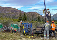 Drill rig crew working on a hole at Metallic Minerals’ Keno Silver project.