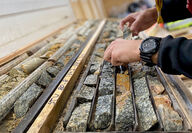 Geologist examining core from Carmacks project in Yukon.