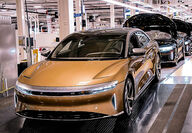 A gold Lucid Air four-door sedan EV at the AMP-1 factory in Arizona.