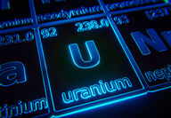 Periodic table entry for uranium in neon blue.