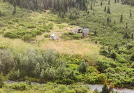 Helicopter near a drill pad at Snowline Gold’s Valley project.