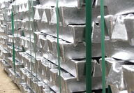 Stacks of aluminum ingots ready for transport.